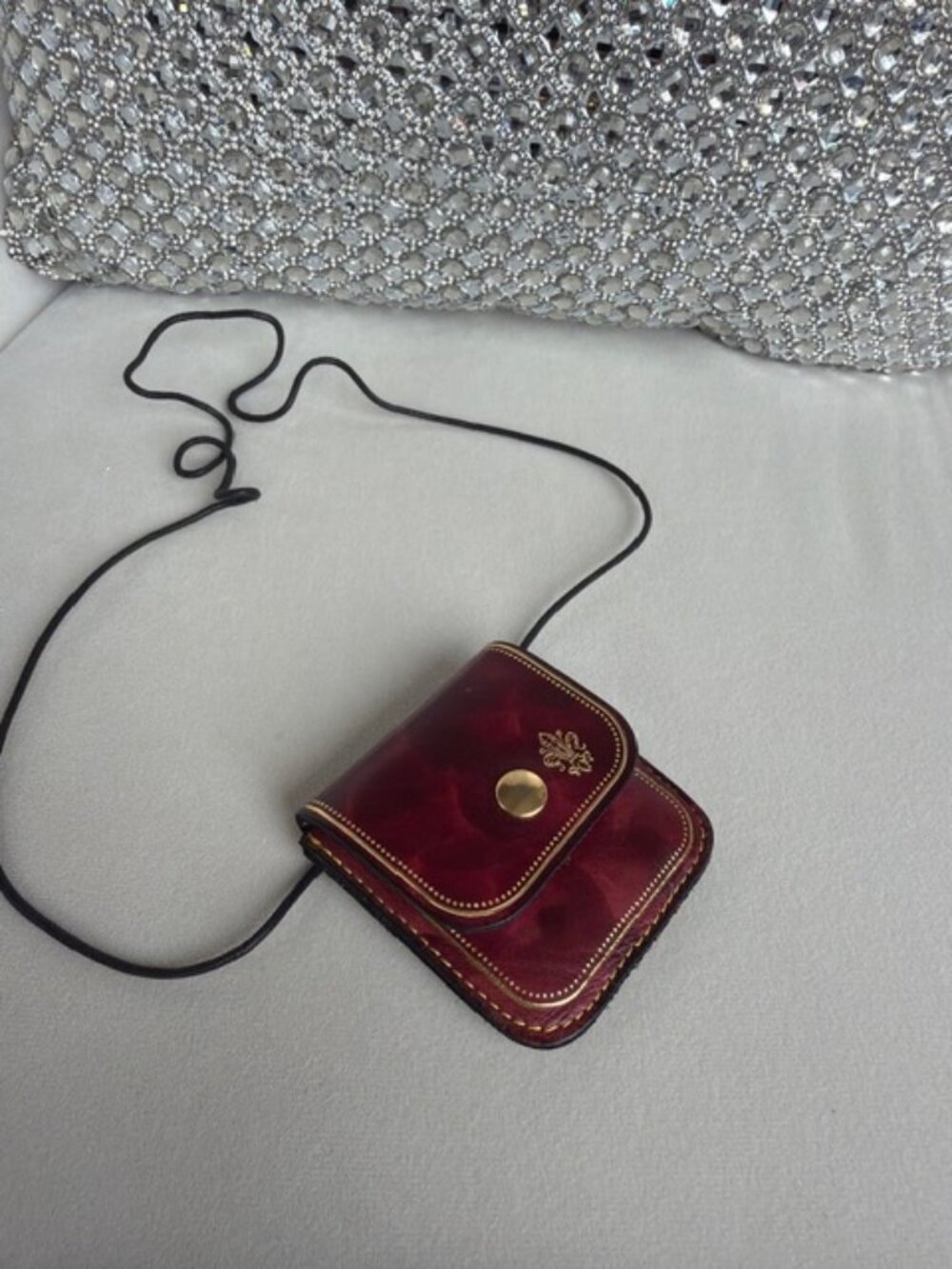 burgundy leather coin or bill tiny bag with gold trim -FP Pelletterie
